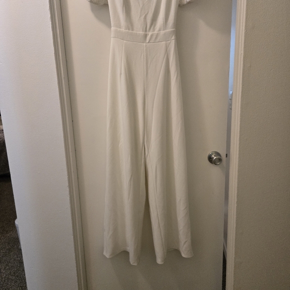 With A Puff Lulus white jumpsuit - Picture 5 of 9